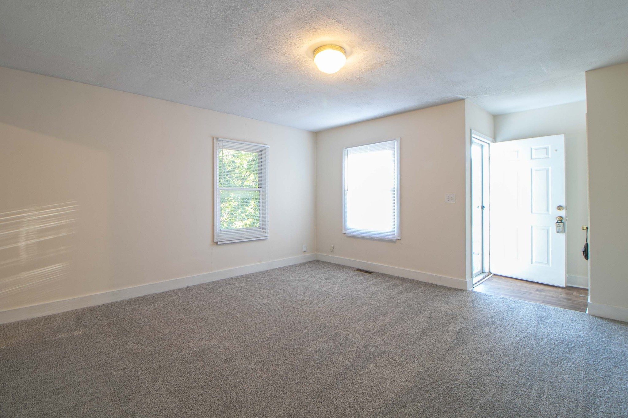 802 Robb Avenue, Unit B Clarksville, TN 37040 - Photo 3 of 15 an empty room with windows