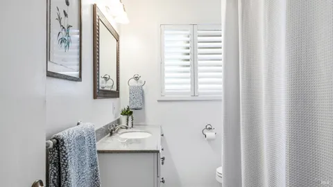a bathroom with a sink and mirror
