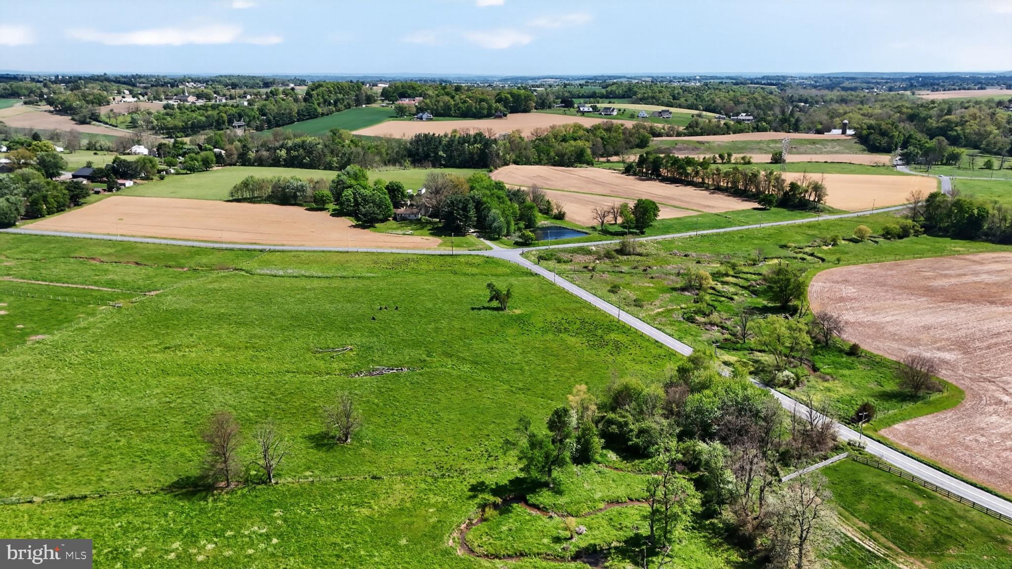 1599 Sanctuary Road Manheim, PA 17545 - Photo 18 of 66 Vibrant countryside with winding roads.