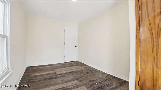 a view of entryway with a front door