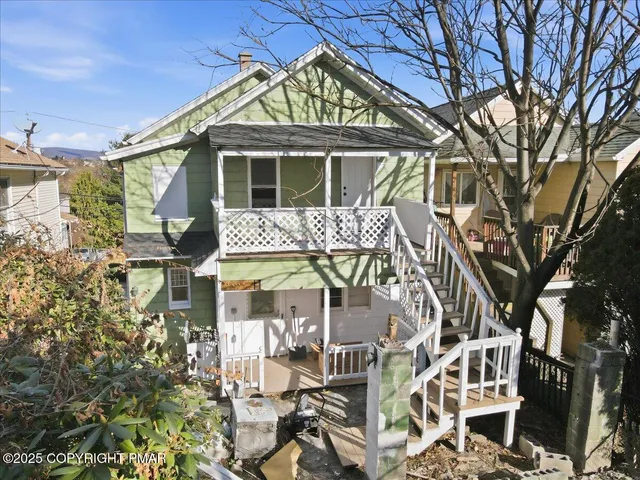 a picture of a room with a black and white wall