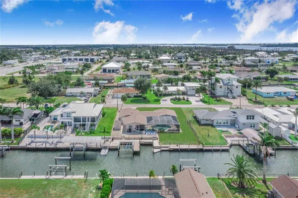 a view of a lake with sitting area