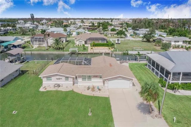 a view of a patio with a table and chairs
