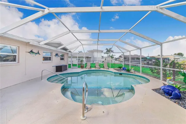 a view of a house with backyard