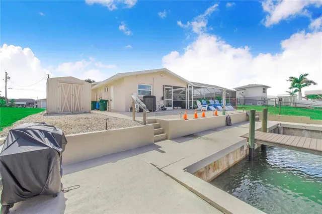 a kitchen with a sink stove and refrigerator