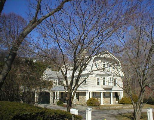a view of a large building with large trees