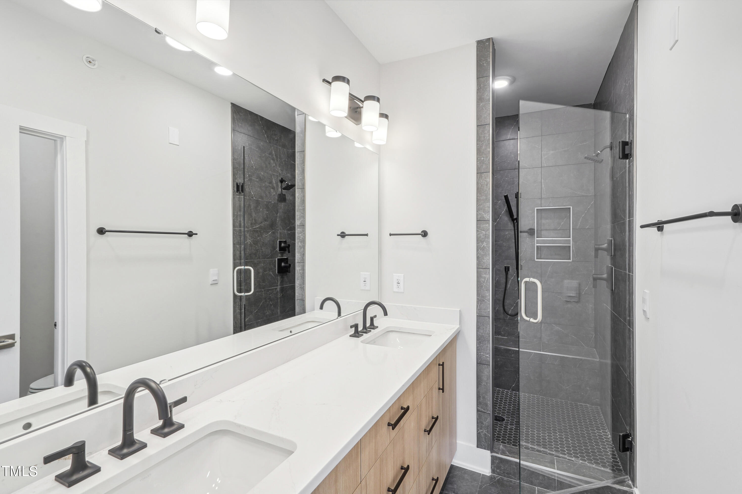 11548 Helmond Way, Unit 120 Raleigh, NC 27617 - Photo 13 of 43 Primary Bathroom