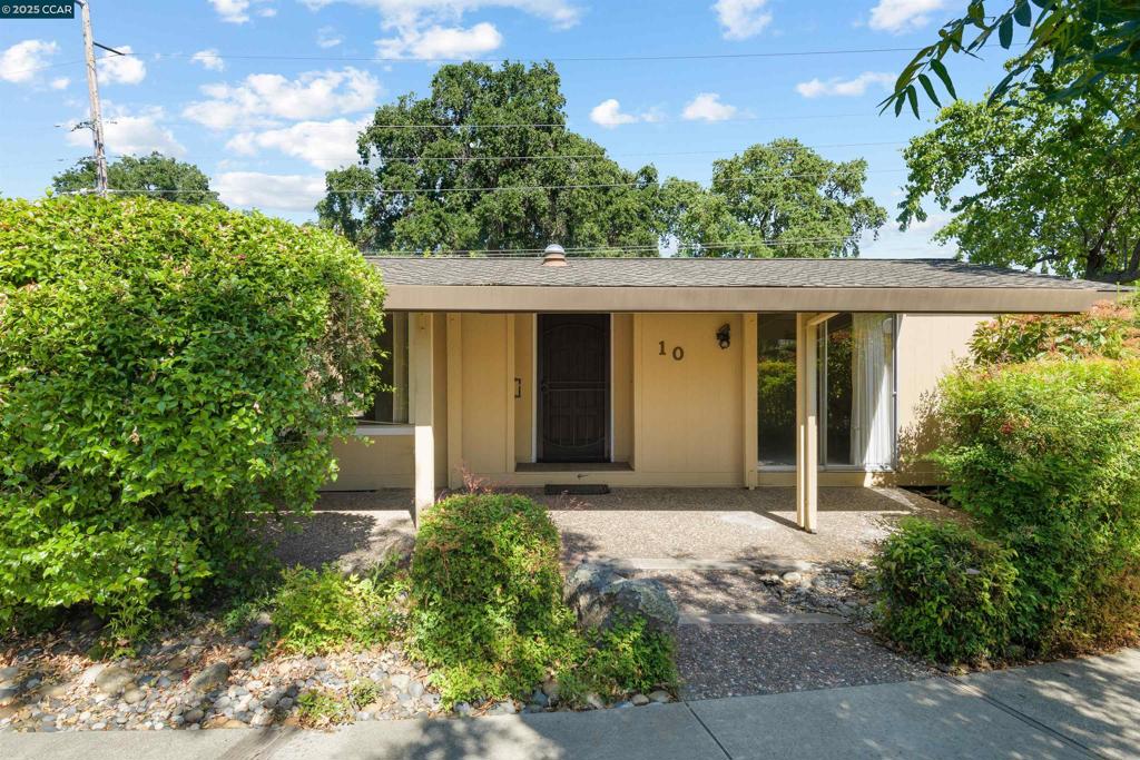 1201 Monument Boulevard Concord, CA 94520 - Photo 1 of 23 front view of a house with a yard