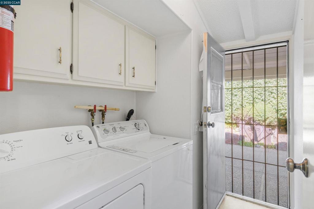 1201 Monument Boulevard Concord, CA 94520 - Photo 11 of 23 a utility room with dryer and washer