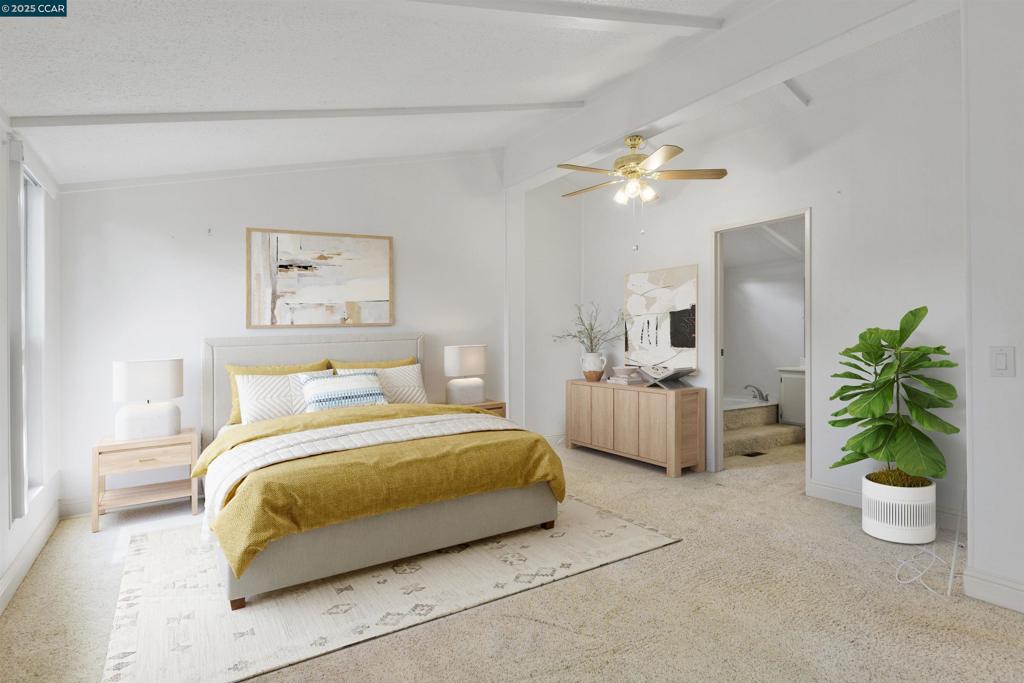 1201 Monument Boulevard Concord, CA 94520 - Photo 12 of 23 a bedroom with a bed and a chandelier