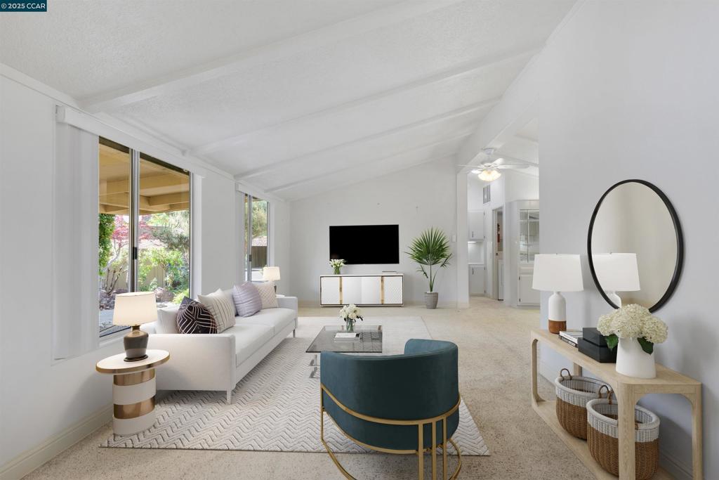 1201 Monument Boulevard Concord, CA 94520 - Photo 2 of 23 a living room with furniture a rug a lamp and a large window