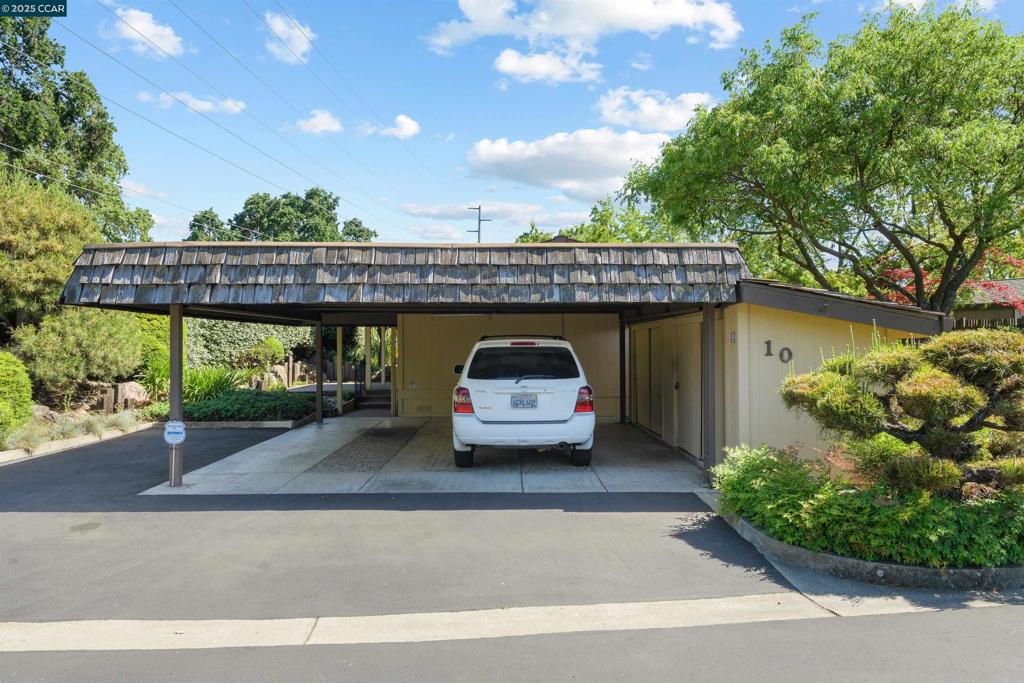 1201 Monument Boulevard Concord, CA 94520 - Photo 21 of 23 a front view of a house with a garden