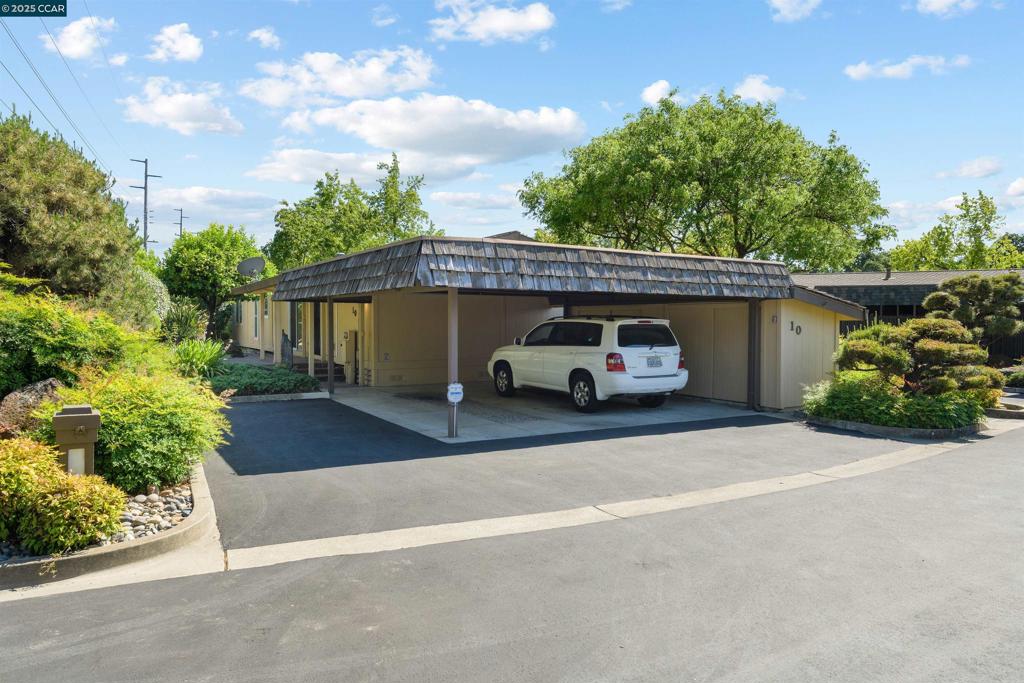 1201 Monument Boulevard Concord, CA 94520 - Photo 22 of 23 a car parked in front of a house