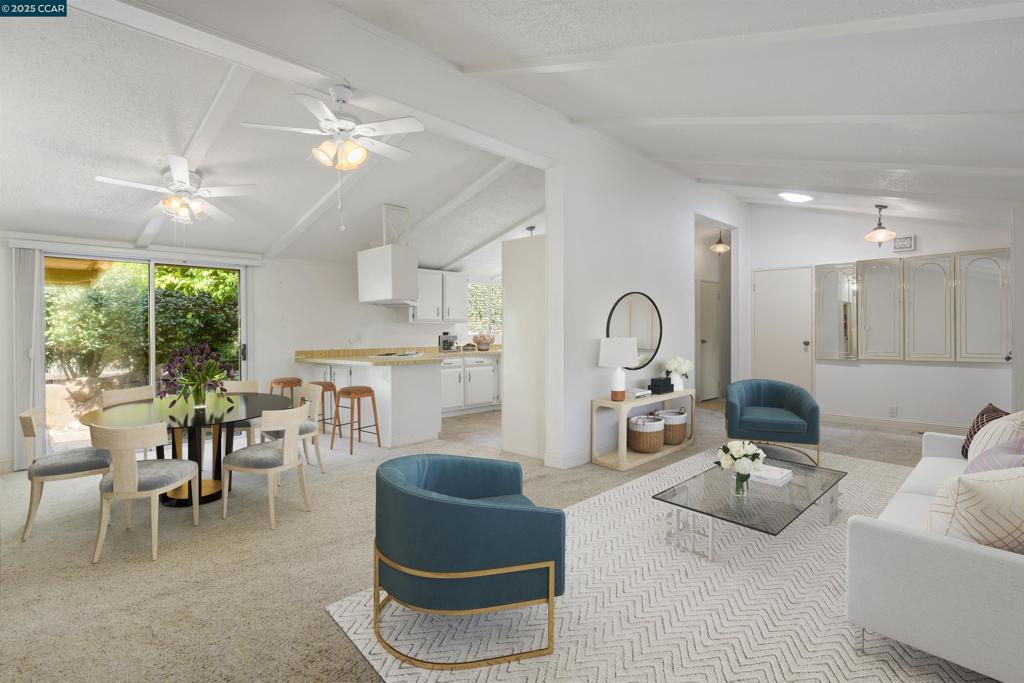 1201 Monument Boulevard Concord, CA 94520 - Photo 4 of 23 a living room with furniture and a large window