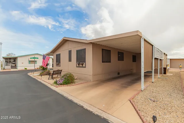 a very nice looking house with a large parking space