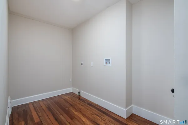 a view of small space with wooden floor