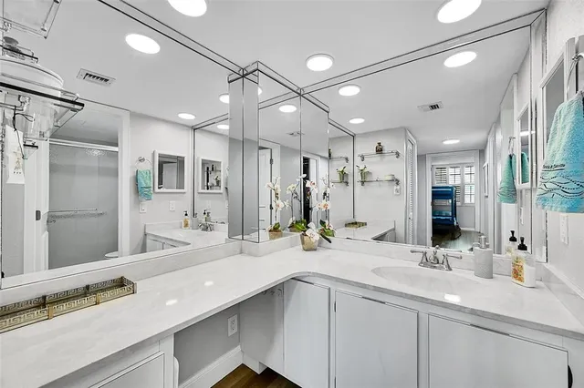 a bathroom with a shower and a toilet