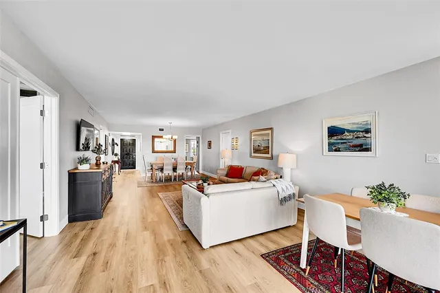 a living room with furniture and a table