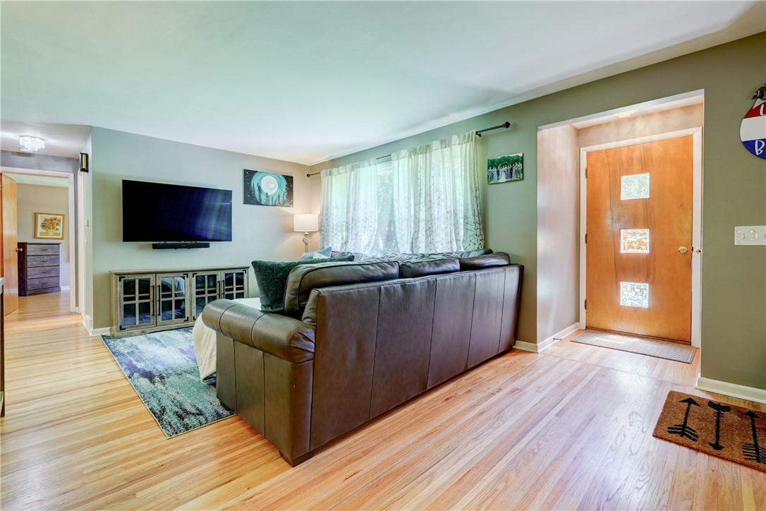 200 Klink Road Brighton, NY 14625 - Photo 2 of 23 Living room with beautiful hardwood floors