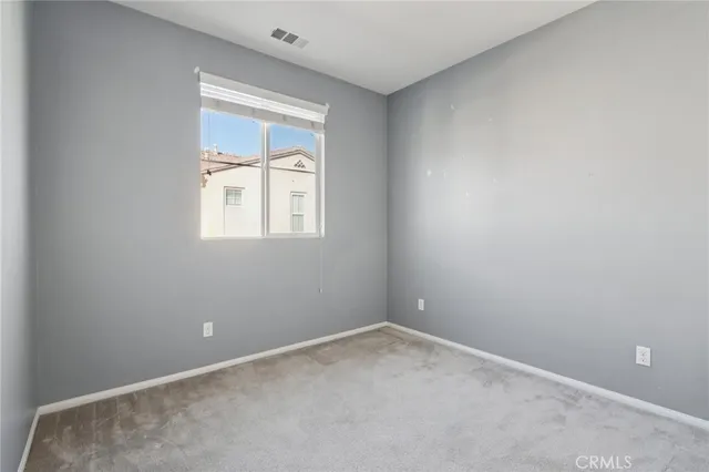 a front view of a building with yard