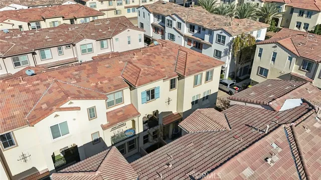 an aerial view of residential building with outdoor space