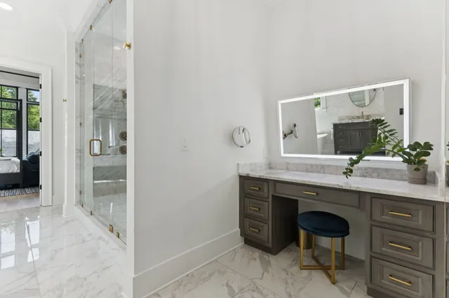 a kitchen with cabinets appliances and a sink