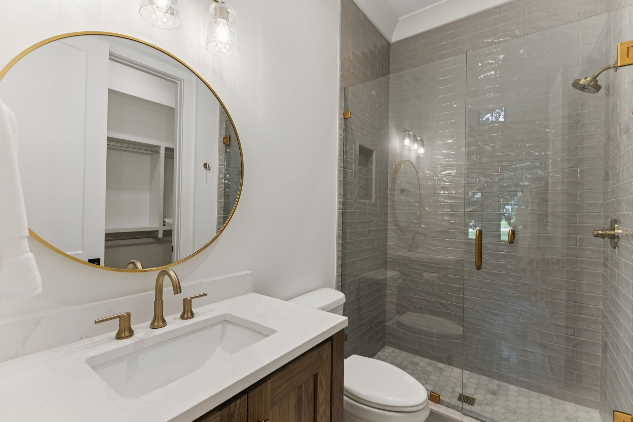 910 Robertson Academy Road Nashville, TN 37220 - Photo 23 of 57 a bathroom with a sink a toilet and shower