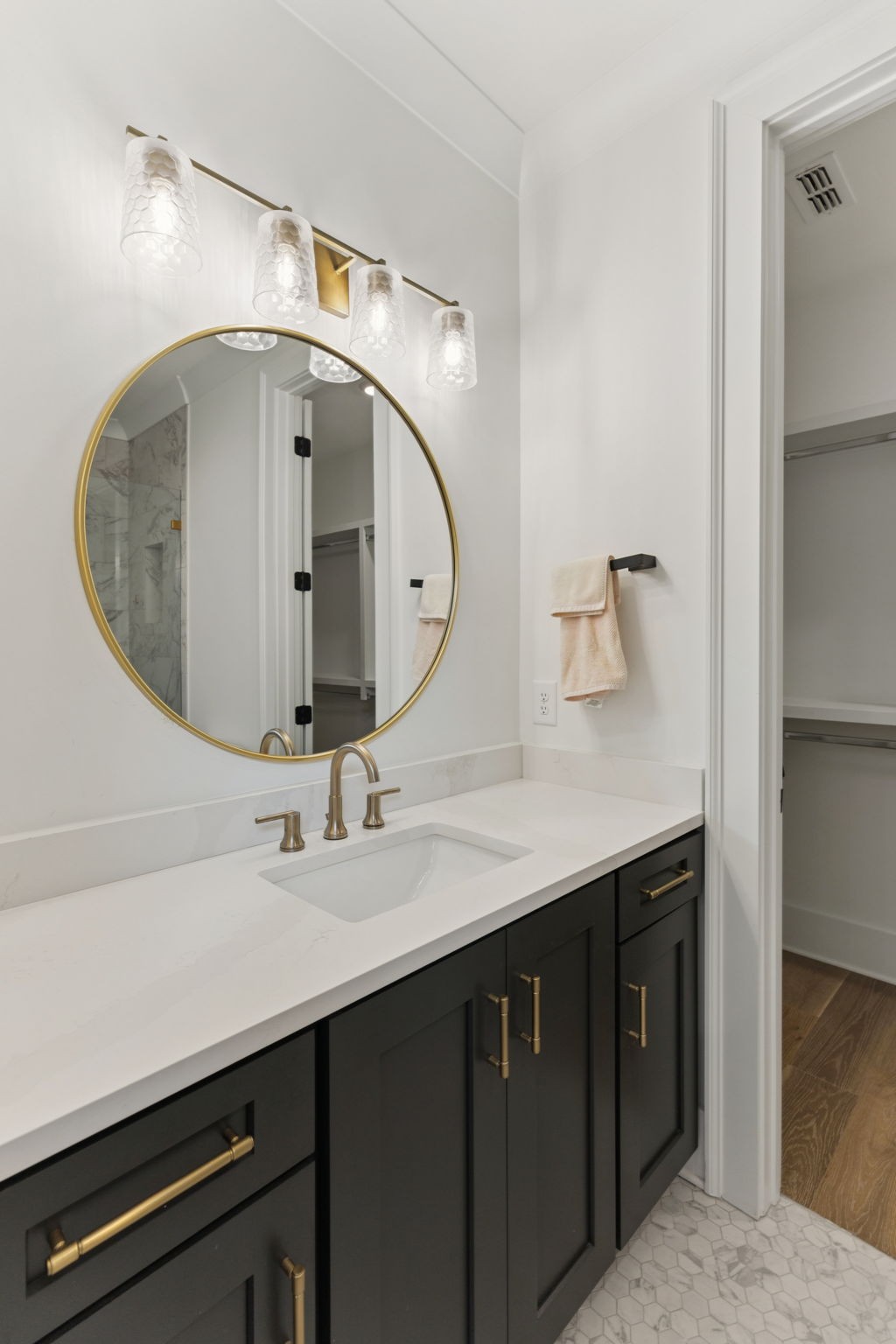 910 Robertson Academy Road Nashville, TN 37220 - Photo 34 of 57 a bathroom with a double vanity sink and a mirror