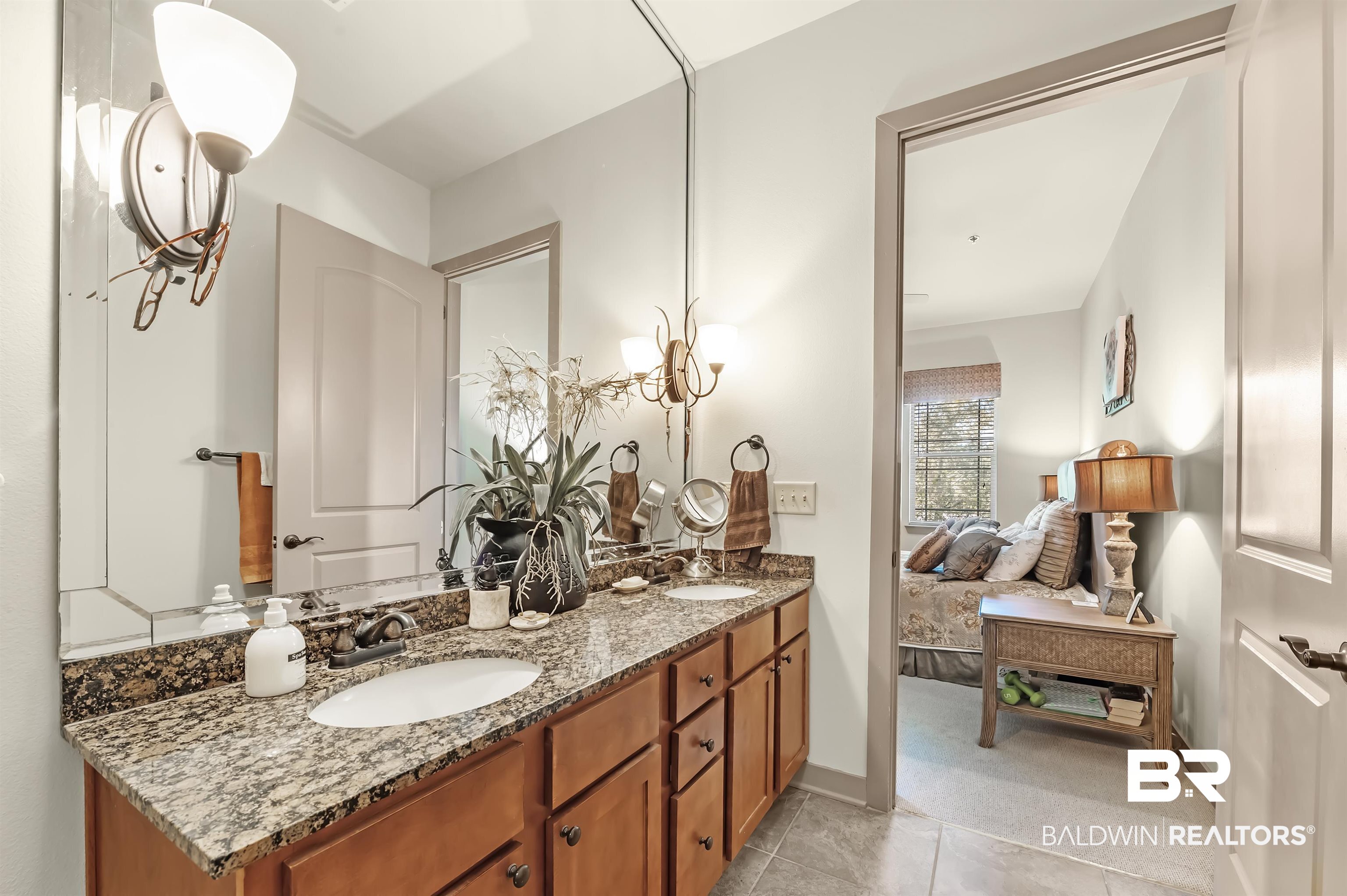 1430 Regency Road, Unit A301 Gulf Shores, AL 36542 - Photo 26 of 47 Bathroom featuring vanity and tile patterned flooring