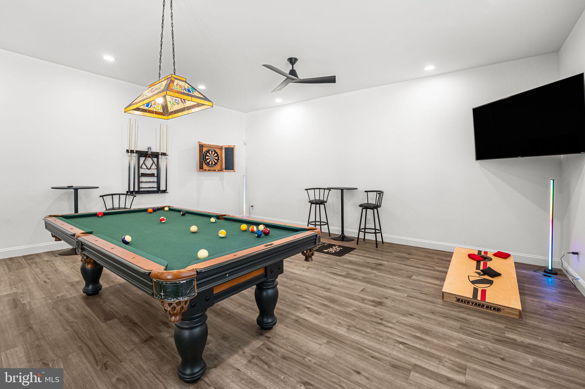 3315 Windmill Point Road White Stone, VA 22578 - Photo 32 of 45 a room with pool table and flat screen tv