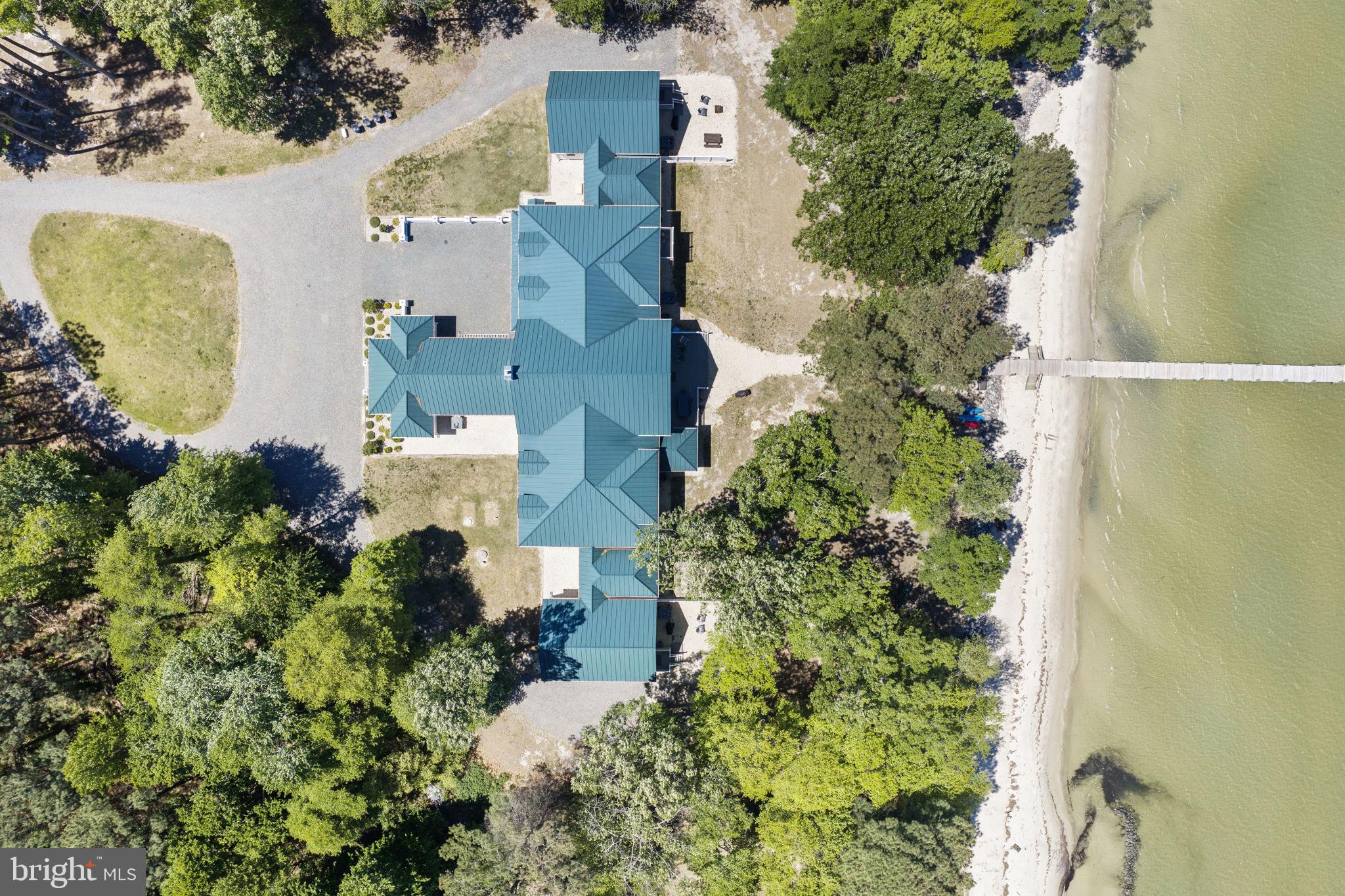 3315 Windmill Point Road White Stone, VA 22578 - Photo 44 of 45 an aerial view of a house with swimming pool