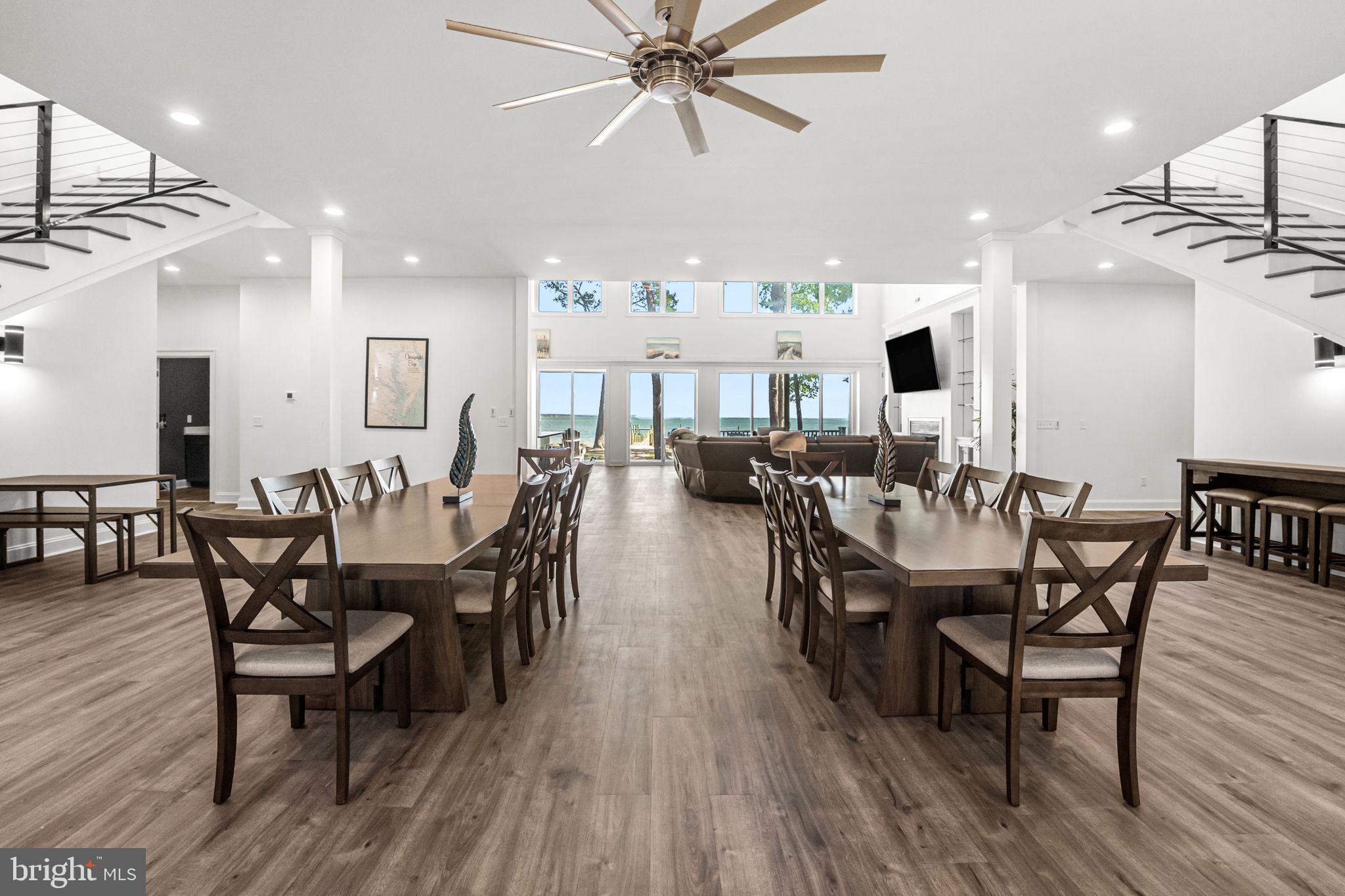 3315 Windmill Point Road White Stone, VA 22578 - Photo 8 of 45 a view of a dining room with furniture and wooden floor