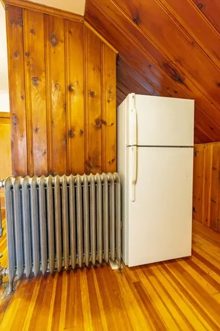 a view of a door with wooden floor