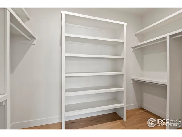 a bathroom with a double vanity sink mirror and
