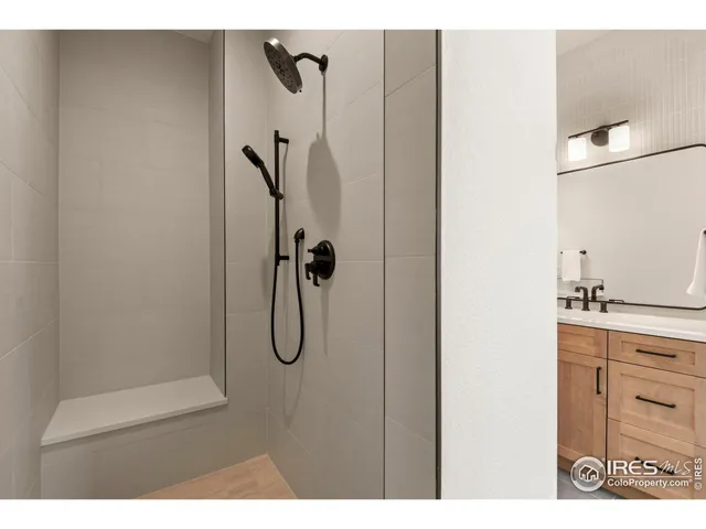 a white bath tub sitting in a bathroom