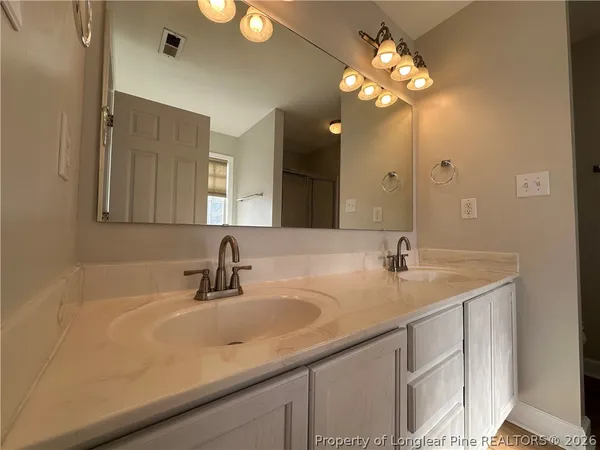 a bathroom with a sink and a bathtub