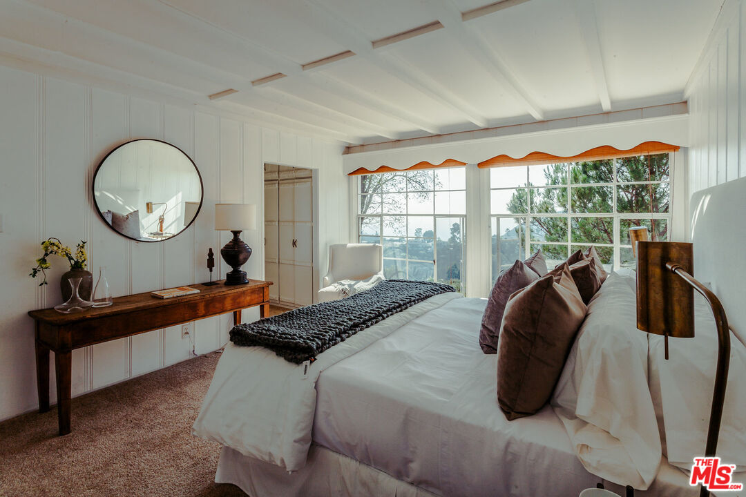 2780 Outpost Drive Los Angeles, CA 90068 - Photo 8 of 20 a bed room with a bed and a window