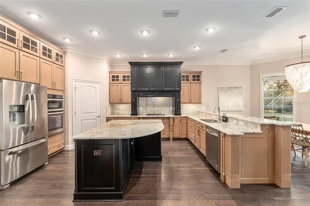 a bathroom with a sink and a window