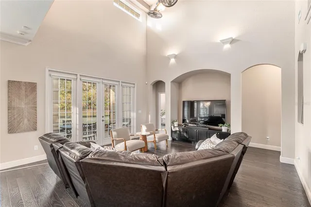 a bathroom with a granite countertop sink a mirror and a shower
