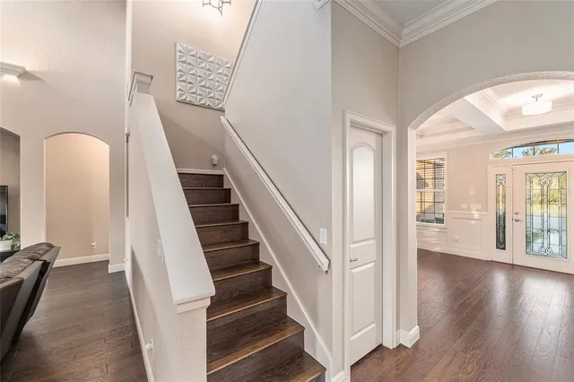 a front view of house with yard and trees