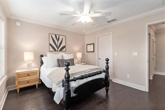 an aerial view of residential houses with outdoor space and river