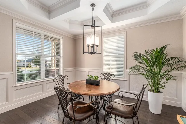 a large kitchen with stainless steel appliances lots of counter top space