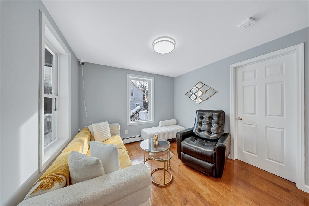 30 Fuller Street Seekonk, MA 02771 - Photo 12 of 42 a living room with furniture and a wooden floor