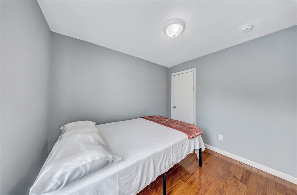 30 Fuller Street Seekonk, MA 02771 - Photo 13 of 42 a bedroom with a bed and a window