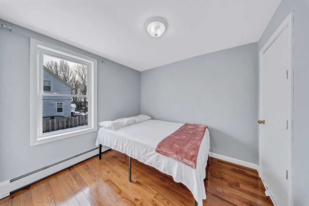 30 Fuller Street Seekonk, MA 02771 - Photo 14 of 42 a bedroom with a bed and a window