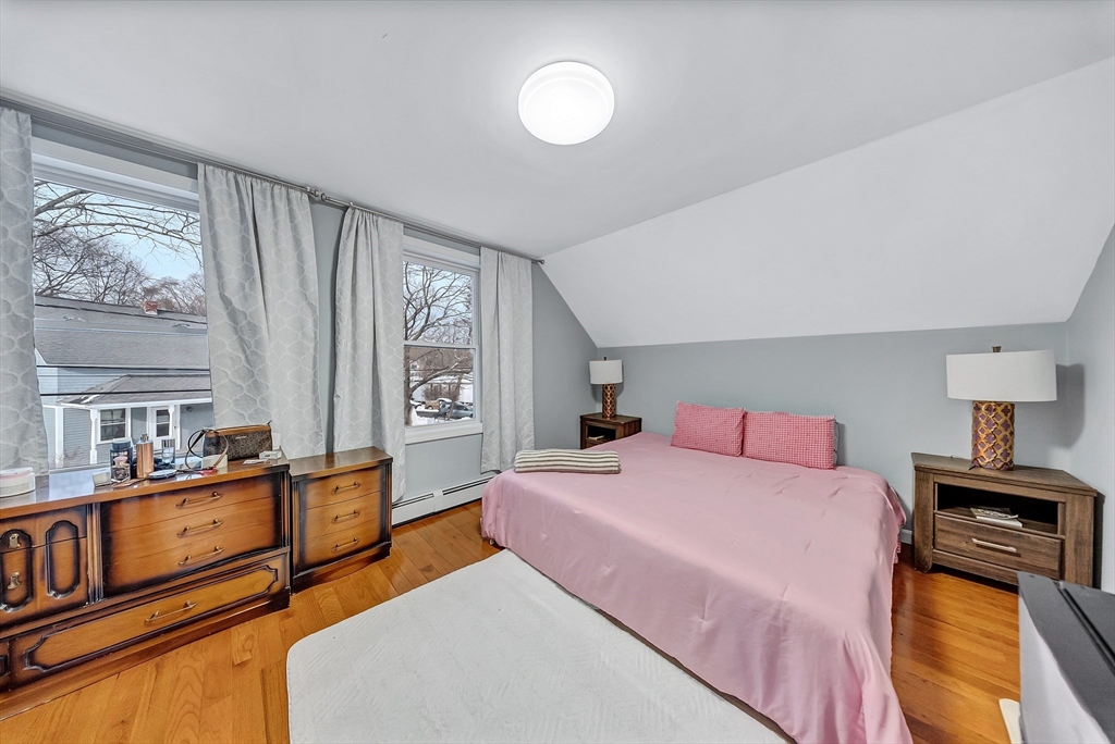 30 Fuller Street Seekonk, MA 02771 - Photo 15 of 42 a bedroom with a bed and wooden floor