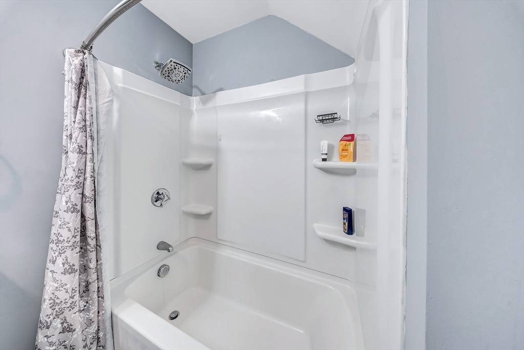 30 Fuller Street Seekonk, MA 02771 - Photo 21 of 42 a bathroom with a bathtub and shower