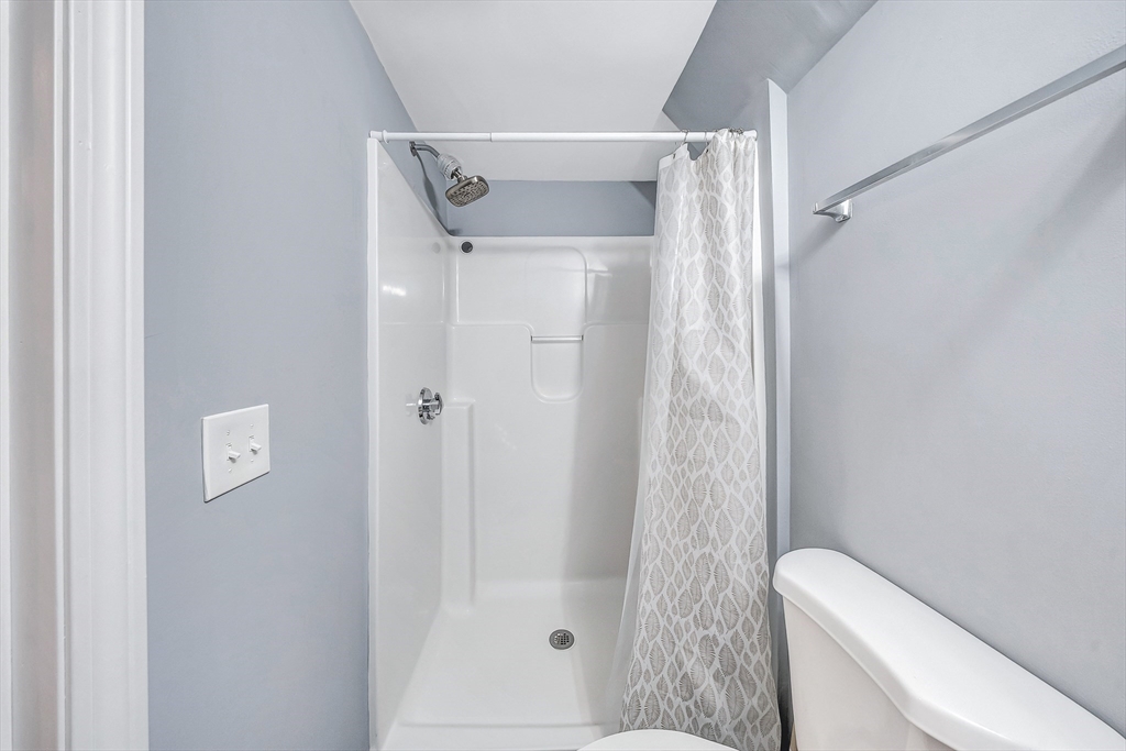 30 Fuller Street Seekonk, MA 02771 - Photo 24 of 42 a bathroom with a shower and toilet