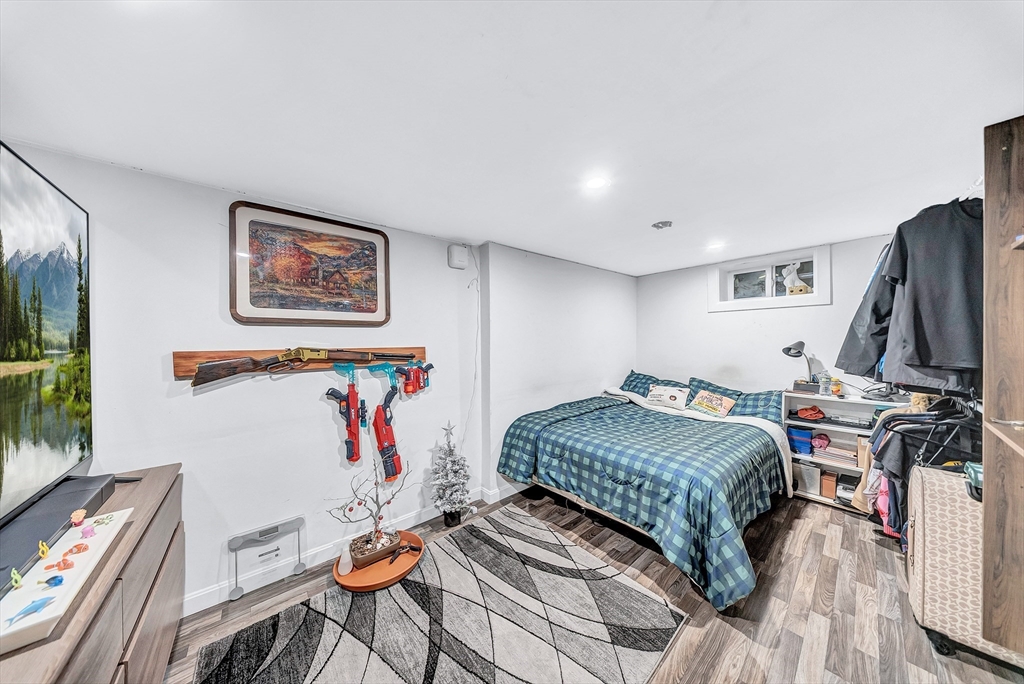 30 Fuller Street Seekonk, MA 02771 - Photo 26 of 42 a bedroom with furniture and a flat screen tv