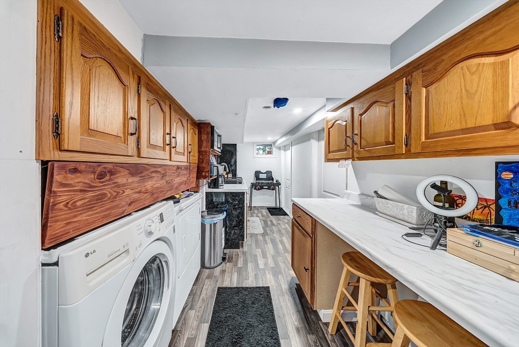30 Fuller Street Seekonk, MA 02771 - Photo 28 of 42 a kitchen with stainless steel appliances granite countertop a stove and a sink
